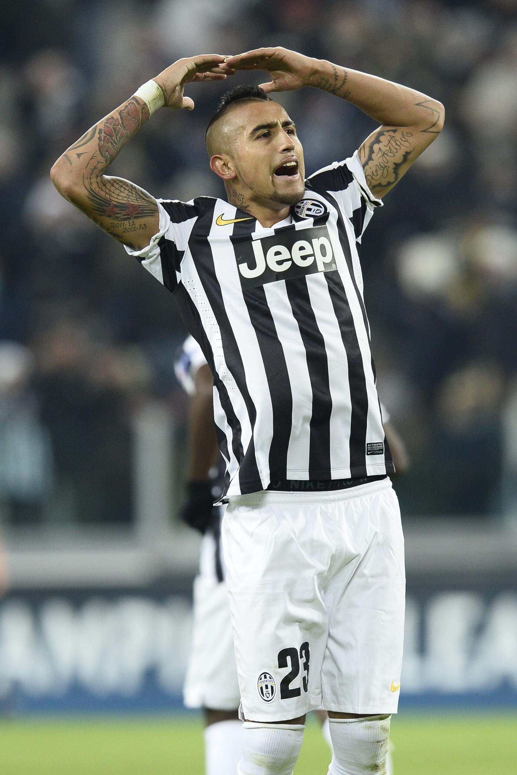 Vidal: "Futuro? Niente United, vado alla Lazio". Ma in realtà intendeva Alassio... - FOTO 21 vidal esulta juventus champions 2013 ifa scaled